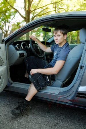 My son Chris & his Graduation Gift (his Mustang)...