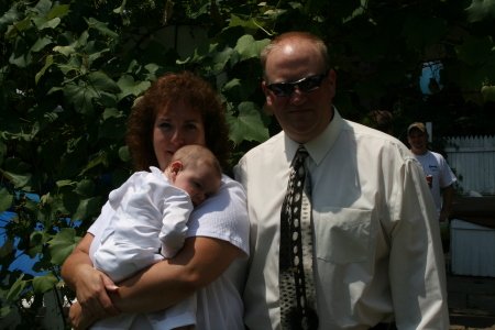 MY HUSBAND AND I WITH OUR NEWEST GODSON CARTER