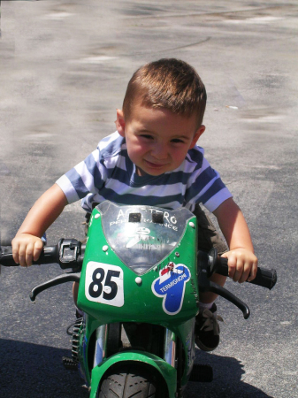 Jonathan riding a moto cycle.