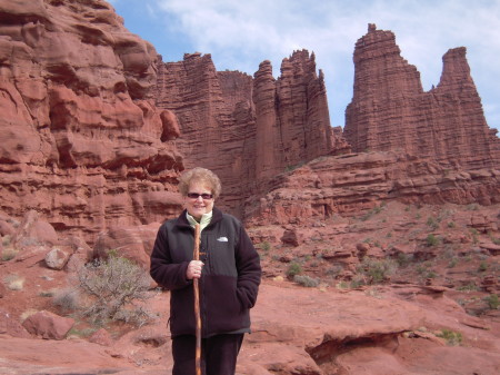 Sue hiking to Fisher Towers