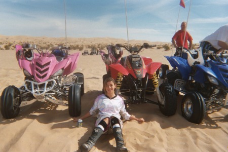 Regan sitting in front of my pink quad