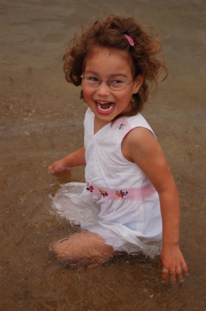 Marisa playing at the beach