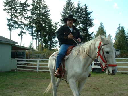 At home giving horses a work out.