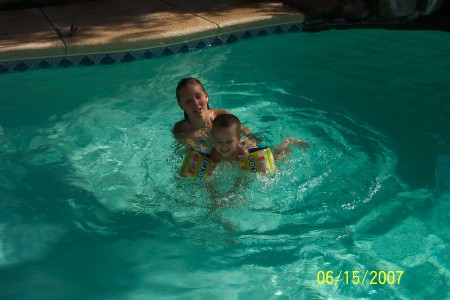 Teaching little brother how to swim