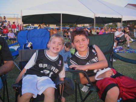 Son Julian (rt) with friend at San Antonio Spurs outdoor event