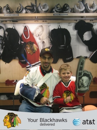 Hubby and Andy (Andy's first Hawks game)