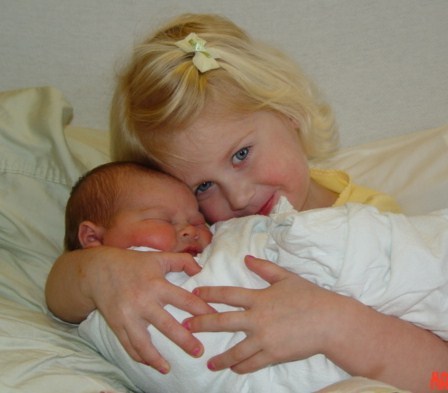 Proud big sister Sidney with Pressley