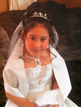 my baby in her holy communion dress