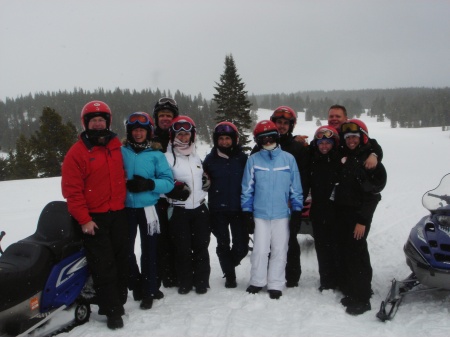 Me,hubby and the gang enjoying a little snow mobile in the Colorado mountains