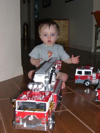 Aiden playing with firetruck