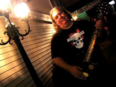 In riverhead with a guitar I won at the long island metalfest