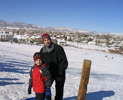 My husband David and son Carter sledding near our house in Colorado