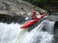 Me kayaking over 12 foot waterfall