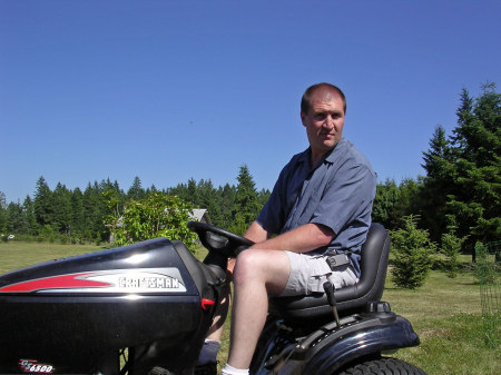 A Man and his Mower (my hubby Tom)