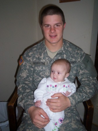 Our little soldier with our grandaughter Haley