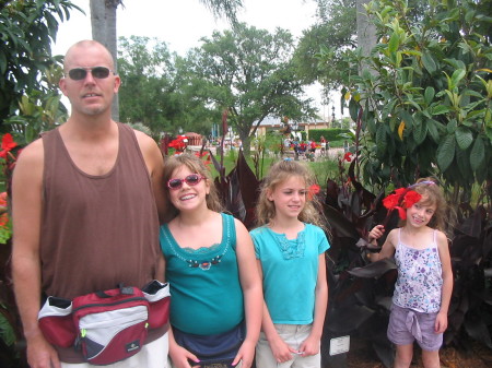 My husband Bruce and the girls in Disney