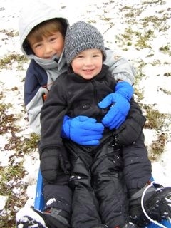 Grant and Mason sledding