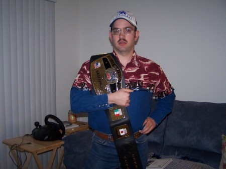 Me holding a Ric Flair Autographed NWA title.