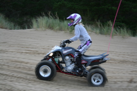 Alaina riding on the dunes