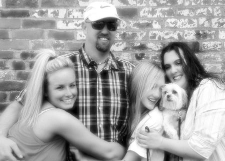 Kevin and his girls the dog is mine