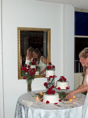 Cutting the cake at  our Commitment Ceremony