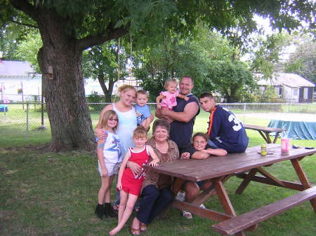 mom with grandkids and great grandkids