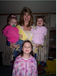 Debbie with her 3 Grand Daughters