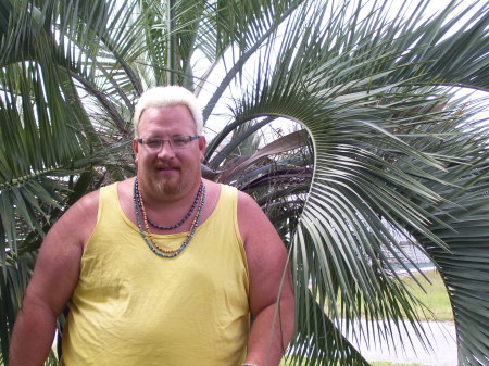 Me, In front of my palm tree at my house