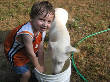 james,luke playing in the water