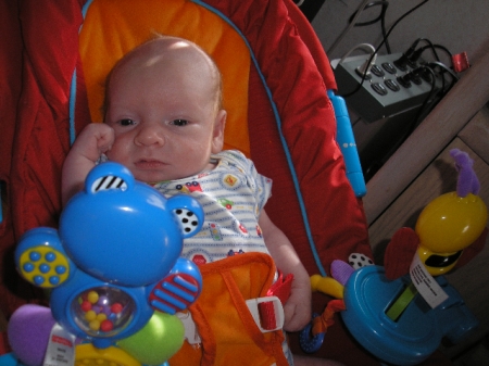 clark in his bouncy chair