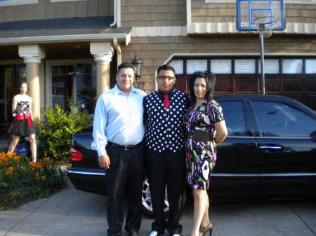 Me and my husband w/ our 18 son 2010 Prom