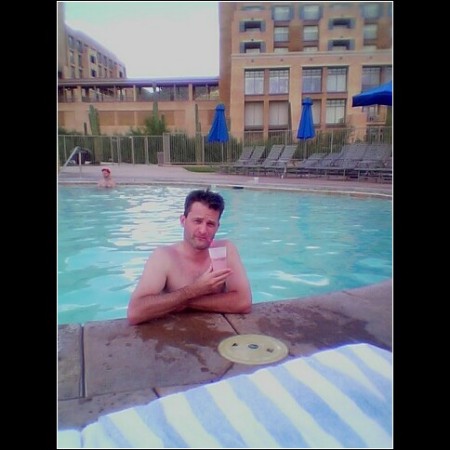 Jim relaxing poolside in Tucson