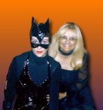 Chrissy dressed as Catwoman and I as a Practical Magic Witch