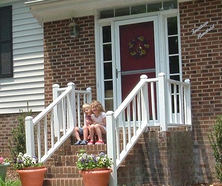 Kids on the front porch of our new house