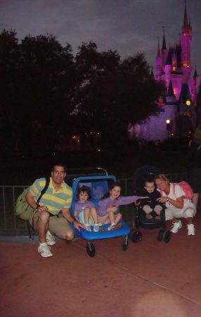 Night photo of my son and whole family at Disney World