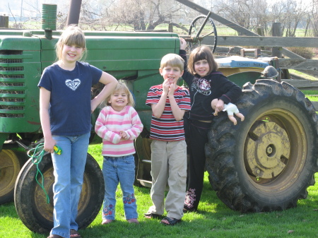 All 4 kids at my Grandpa's ranch