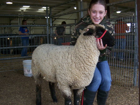 My daughter with award winning sheep