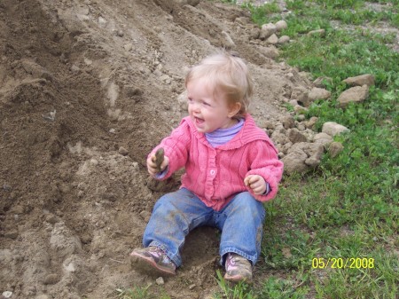 Meredith in the dirt pile