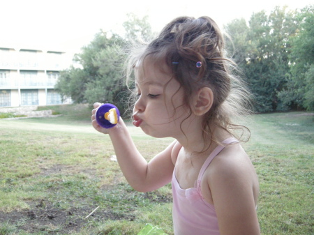 Anna Kate blowing bubbles