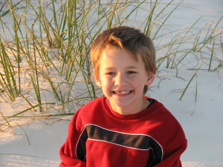 My grand son on the beach on NAS pensacola while we were flying kites