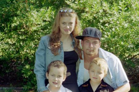 Stepson and wife with children