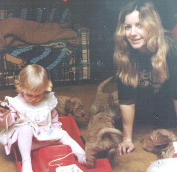 1984 Our litter of Goldens- Our daughter & me