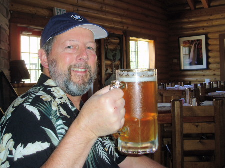 Enjoying a big beer after mountain biking the Slick Rock trail, Moab, Utah