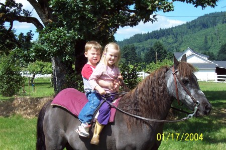 Zach and his friend Bethany on Ray Ray the pony