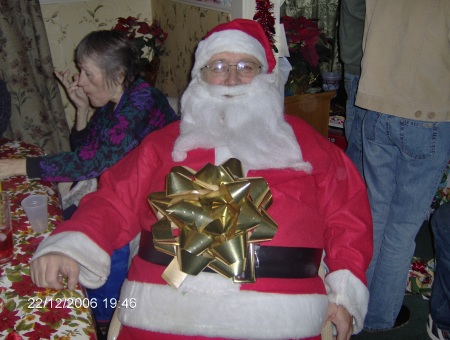 my husband playing santa 2006