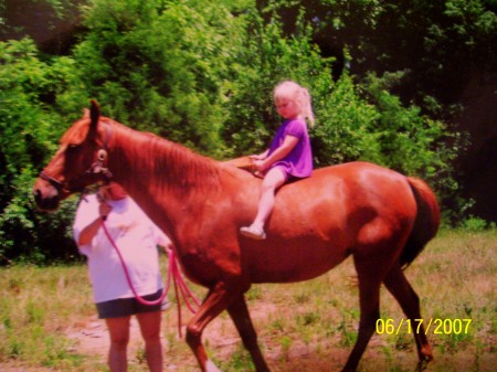 My daughter riding my horse Misty