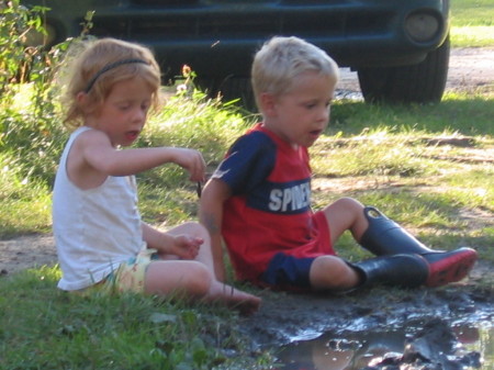 twins in mud camping