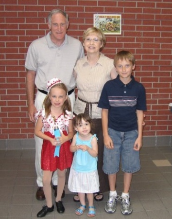 My husband and me with 3 of our grandchildren.  June '06