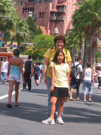 My baby and me in MGM posing in front of Tower of Terror