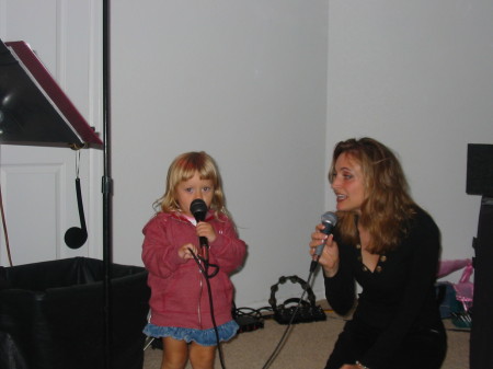 daughter Melody helping Mom sing "Man I Feel Like A Woman"